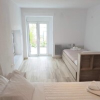 Panorama House 10 Panorama House – υπνοδωμάτιο με διπλό κρεβάτι, έξτρα μονό/συρόμενο και πόρτα προς μπαλκόνι