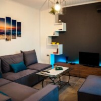 Aegean View Villa 8 Aegean View Villa – Γωνιακός καναπές με μοντέρνα διακόσμηση στο σαλόνι