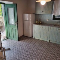 Kaliva Luxury Villa 17 Kaliva Luxury Villa – Μικρή τραπεζαρία δίπλα στο καθιστικό σε νησιώτικο στυλ