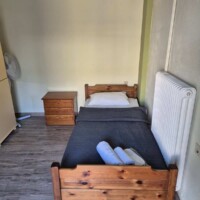 Old Town Apartment 6 Επιπλωμένο υπνοδωμάτιο με μονό κρεβάτι και κομοδίνο σε διαμέρισμα στην Καβάλα