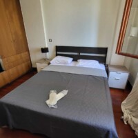Οld Τown with sea view 4 Υπνοδωμάτιο διαμερίσματος στην Παλιά Πόλη Καβάλας με ντουλάπα και καθρέφτη
