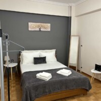 Depys Apartment 5 Comfortable double bed in modern open living area apartment in Kavala Greece.