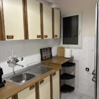 Depys Apartment 4 Fully equipped kitchen with sink and cabinets in modern apartment in Kavala Greece.
