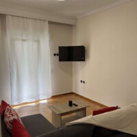 Depys Apartment 2 Spacious living room with sofa and double bed in stylish apartment in Kavala city center.
